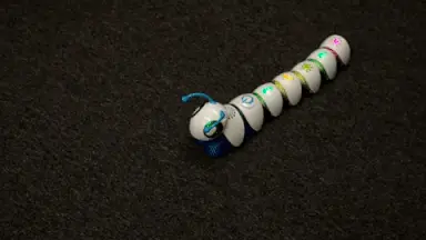 The Code-a-Pillar moves around on the ground.