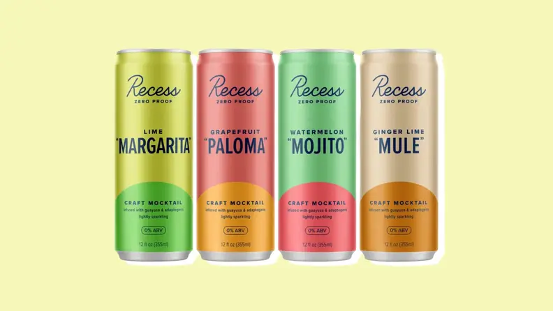Four Recess mocktail cans on a yellow background