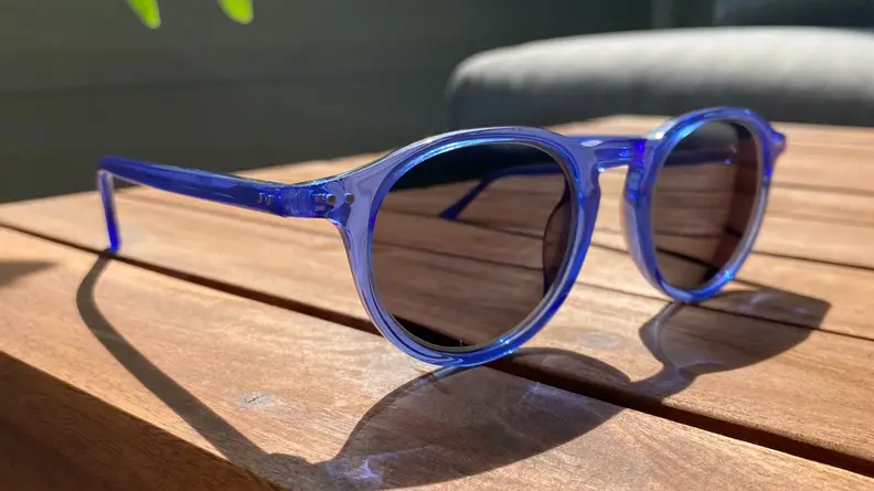 GlassesUSA glasses on a deck