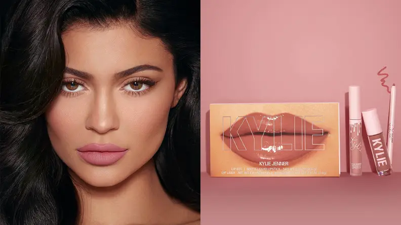 Kylie Jenner smiles wearing Kylie Cosmetics.