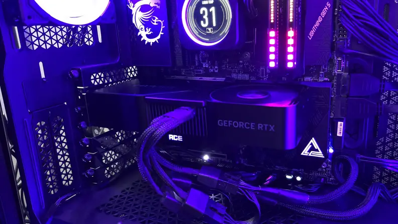 The Nvidia RTX 4070 installed with a purple light surrounding the system.