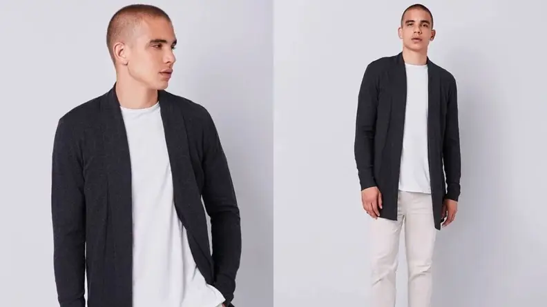 Man wearing a white t-shirt underneath a black cardigan that has no closure or pockets from Forever 21.