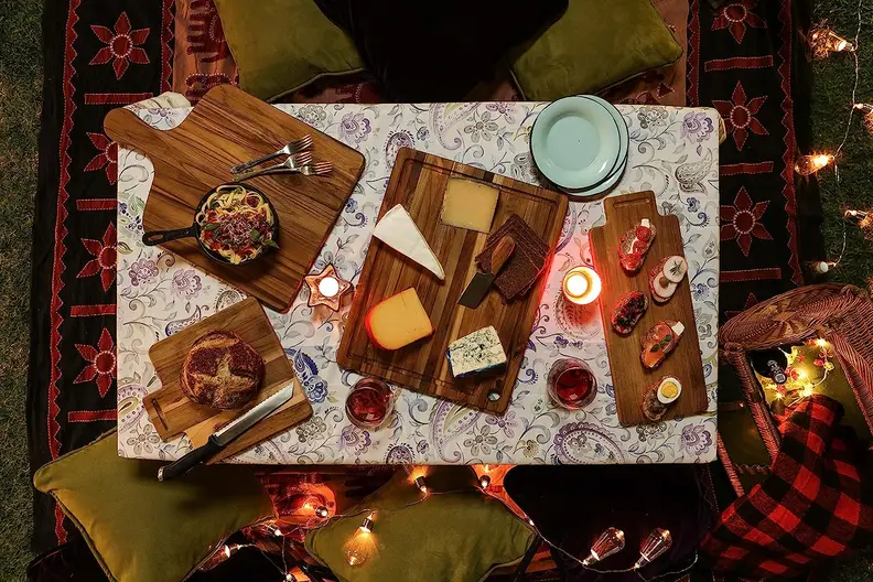 Several wooden cutting boards topped with food, shot from above
