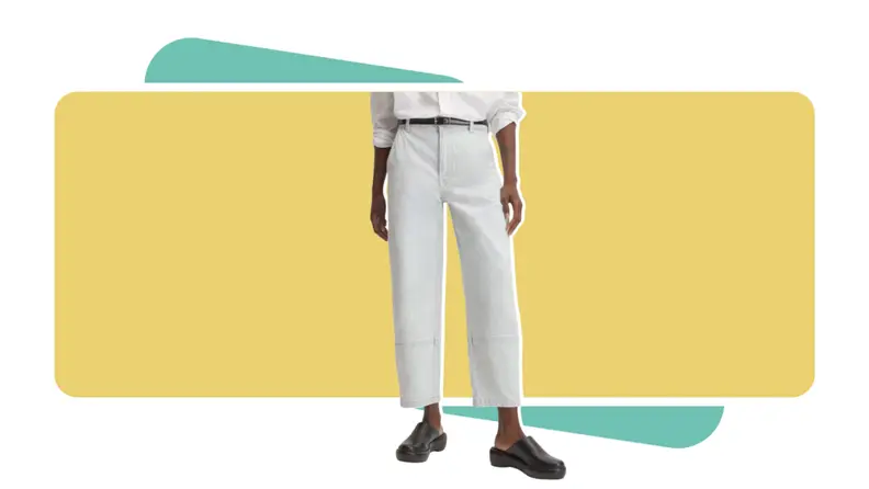 A model wearing light wash jeans.