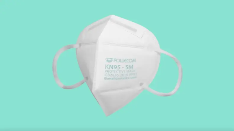 White Powecom disposable face mask.