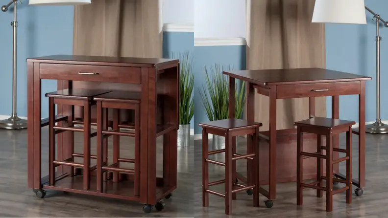 Brown wooden dining table with two chairs in living room.