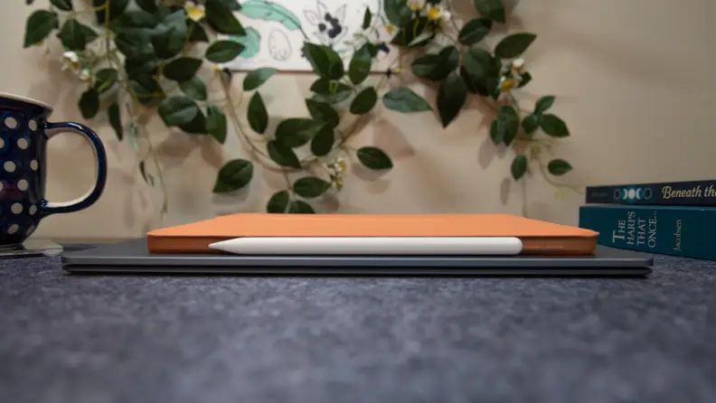 An iPad Air 4 stacked on the Surface Laptop 4 for comparison