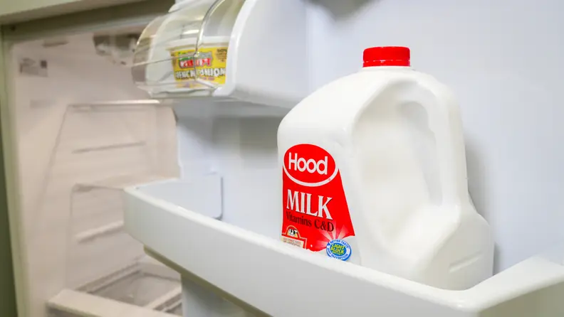 Gallons of milk and juice  fit in the door bins, conserving space in the refrigerator section