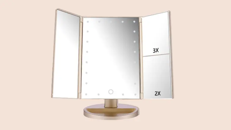 A gold DeWeisn Tri-Fold Lighted Mirror opened fully on a tan background.