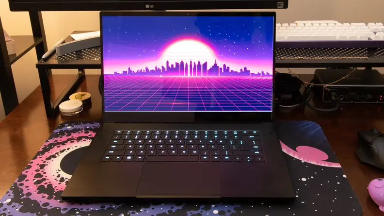 A shot of the Razer open, on a galaxy themed deskmat