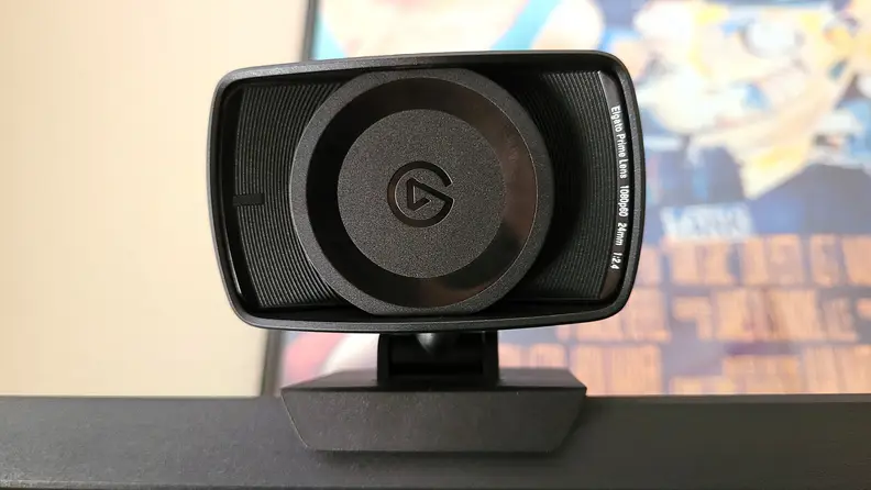 A straight on view of a webcam with a lens cover