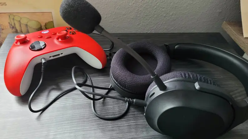 The Razer Barracuda X plugged into an Xbox Series X controller
