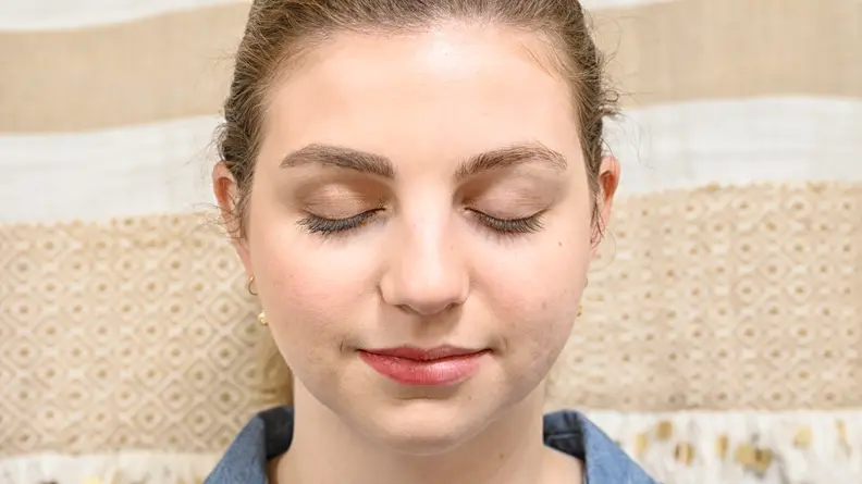 The author's face before (left) and after (right) using the Makeup Eraser.