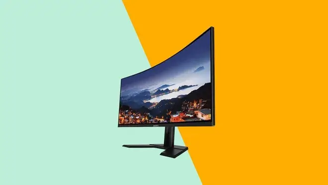 The Gigabyte curved gaming monitor in front of an artistic background.
