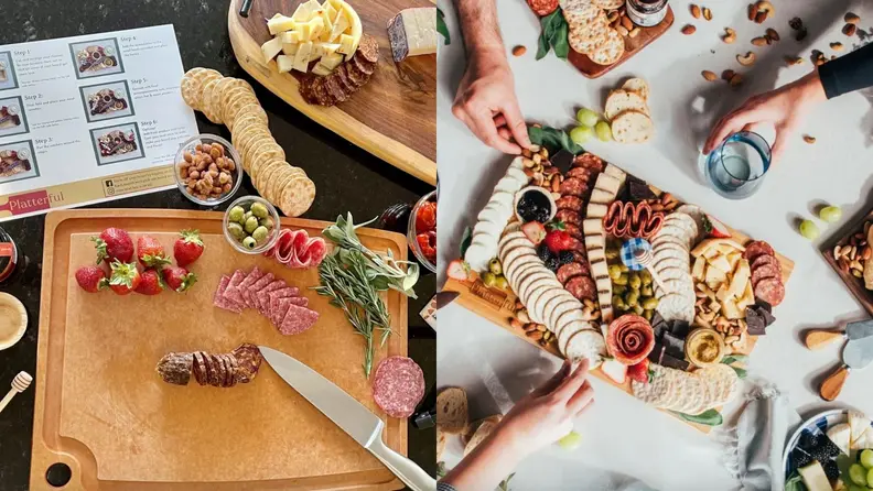 Two cutting boards with delicious cheeses and snacks spread all over them.