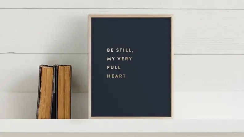 These prints feature metallic foil on a navy blue background.
