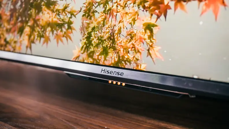 A close-up of the Hisense U7G's Google Assistant microphone switch in its off position