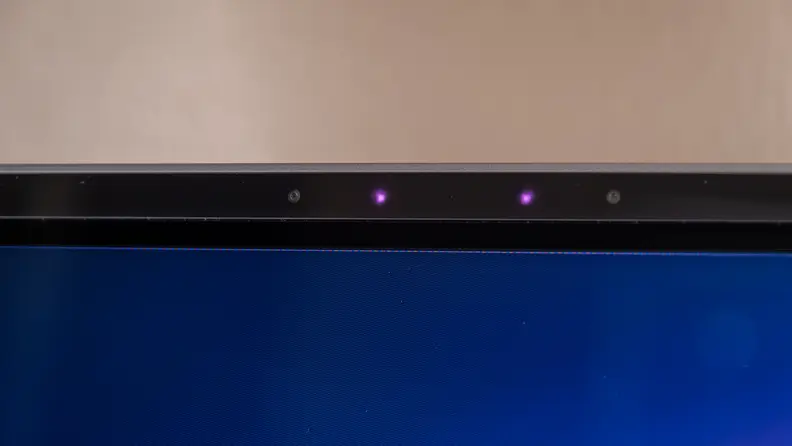 The top of a monitor with two purple lights