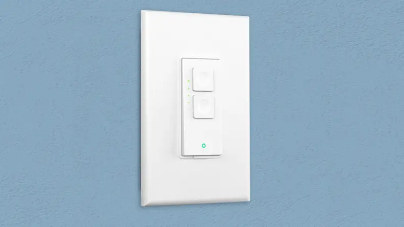 The Meross Wi-Fi Dimmer Switch installed on a blue wall.