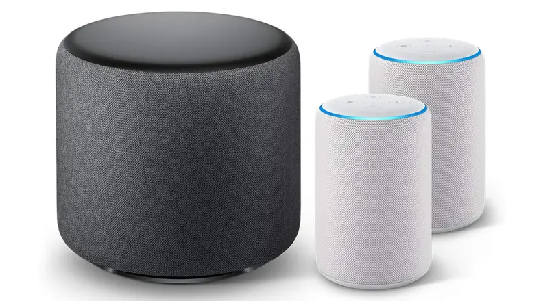 An Echo Sub next two two Echo Pluses