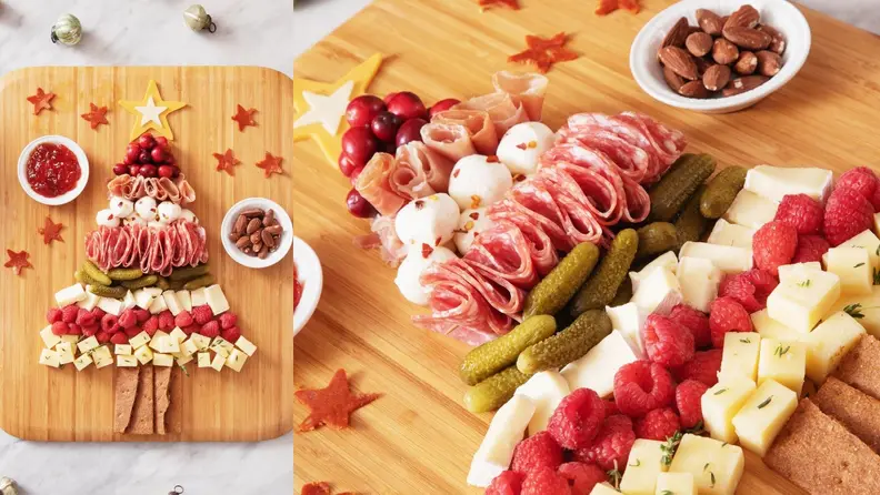 A cutting board with snacks making up a Christmas tree on top.