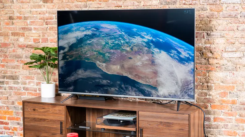 The Amazon Fire TV Omni displaying 4K content in a living room setting