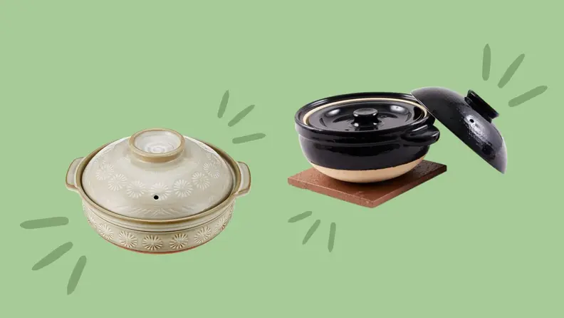Two Japanese-made donabe clay pots on a green background.