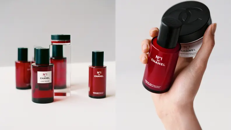 On the left: Several red transparent cosmetic bottles grouped together. On the right: Someone's hand holding a red glass bottle and a jar with a black lid with a Chanel logo on it.
