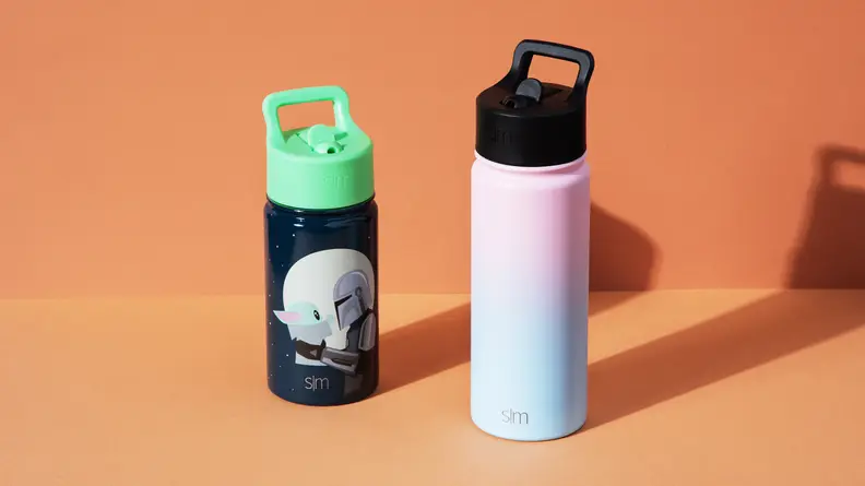 Two Simple Modern water bottles on an orange background.