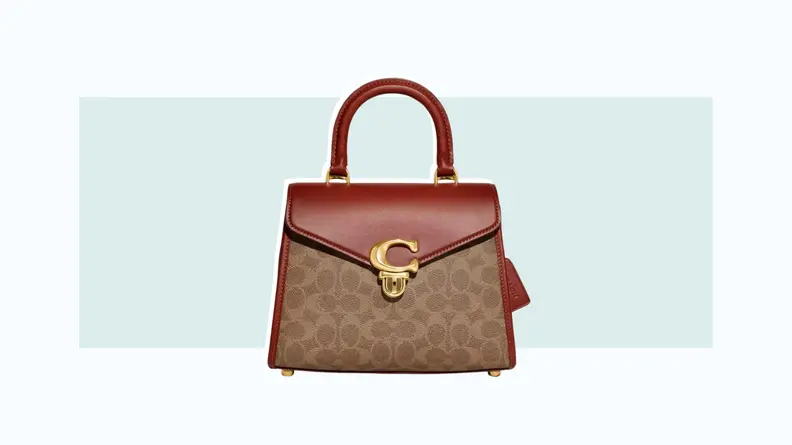 A handbag made from coated canvas in Coach’s signature ‘C’-logo print.