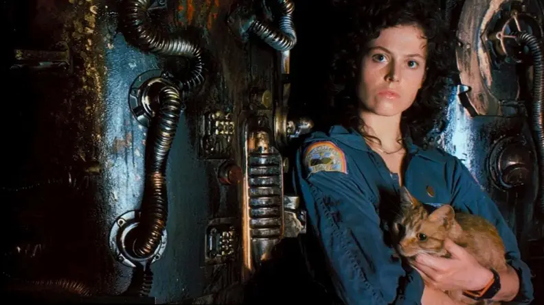 Sigourney Weaver as "Ripley" from Alien, holding her cat and wearing a Casio A100 watch.
