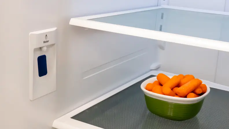 The built-in water dispenser, located on the left side of the Hisense HRF266N6CSE French-door refrigerator.