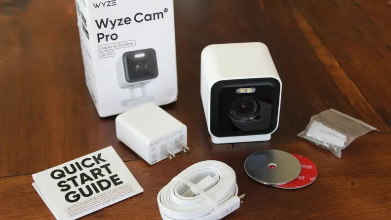 The Wyze Cam V3 Pro and all of its contents outside its retail box.