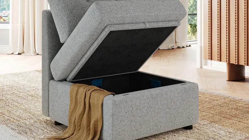 A section of the Linsy Home modular couch lifted to show the empty bottom.