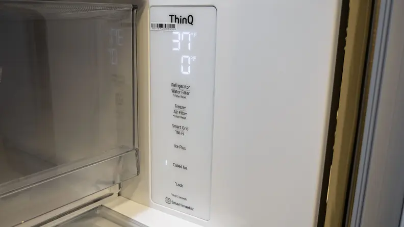 A close-up of the fridge's control panel, located on the right-side interior wall.