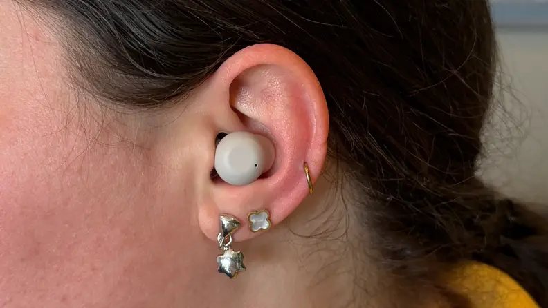 ELEHEAR Delight Hearing Aid shown in woman's ear.