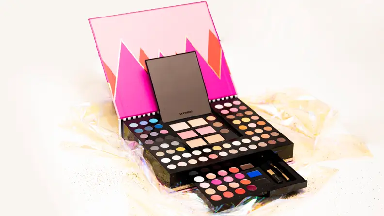 The Sephora Collection makeup palette sitting on glittery cellophane.