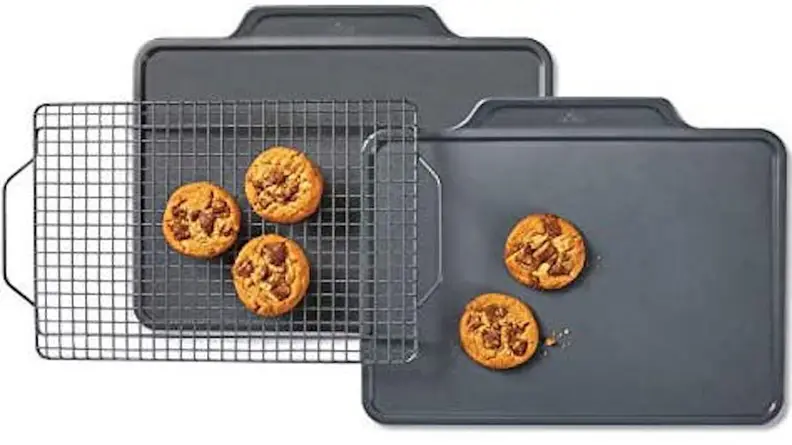 A product image for All-Clad bakeware shows a small batch of cookies, seemingly fresh from the oven.
