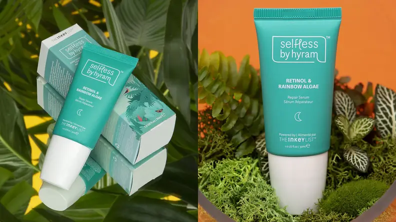 On the left: The Selfless by Hyram Retinol & Rainbow Algae Repair Serum in its blue tub laying on top of its box packaging on a grassy background. On the right: The same blue serum bottle standing amongst grass on an orange background.