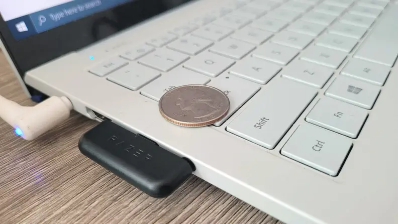 Razer USB-C transceiver plugged into a laptop