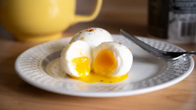 medium boiled eggs on a plate