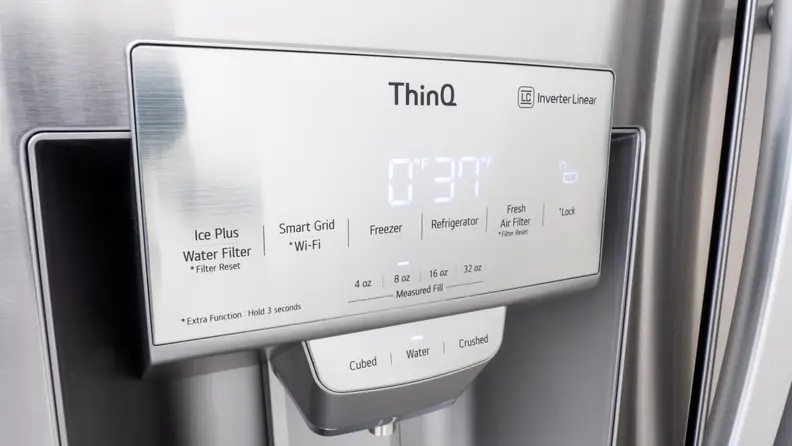 The through-the-door dispenser provides filtered water as well as cubed and crushed ice.