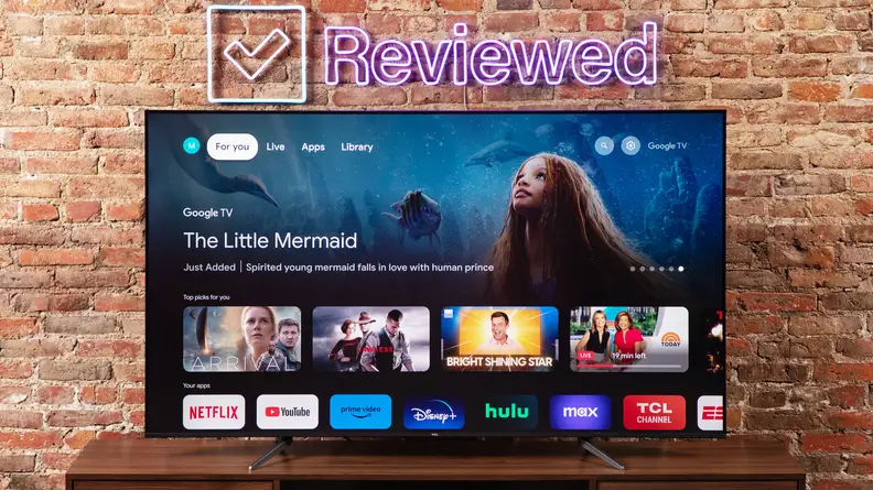 TCL Q6 LED TV with Google TV interface on screen.
