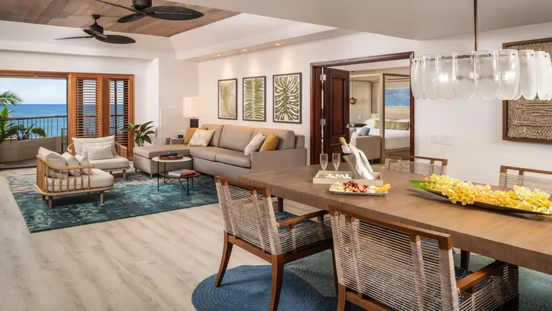 A large beachfront resort suite living space