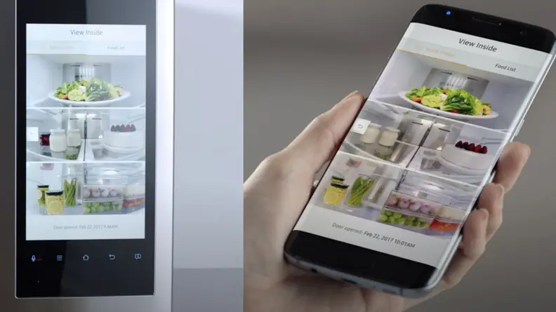 Person using smartphone to review what's inside of refrigerator.