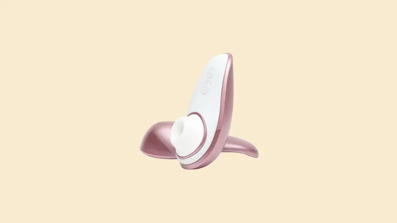 Lovehoney womanizer vibrator in white and pink.