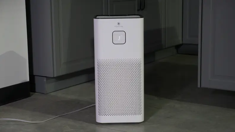 A Medify MA-50 air purifier sits on a carpet.