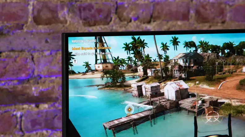 Close-up of a corner of the monitor displaying the video game 'Far Cry 6.'