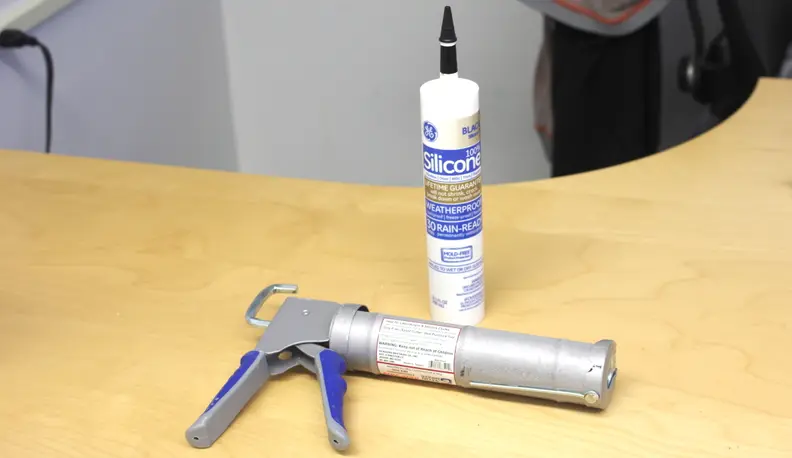 General Electric Caulk and Newborn Caulk Gun