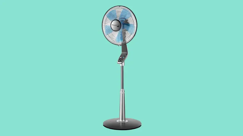 A tall pedestal fan appears on a teal background.